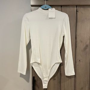 Beautiful bodysuit by Downeast.